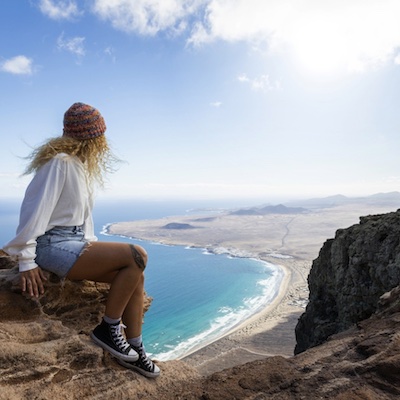 Gut-Summit-Biocidin-woman-on-hill-over-ocean